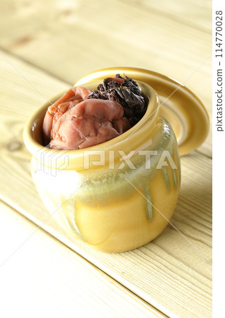 Pickled plums and red shiso in a jar Pickled plums and red shiso in a jar 114770028
