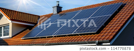 residential building on European street with solar panels installed on the roof. summer. 114770878