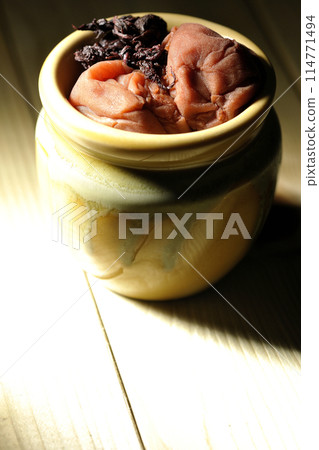 Pickled plums and red shiso in a jar Pickled plums and red shiso in a jar 114771494