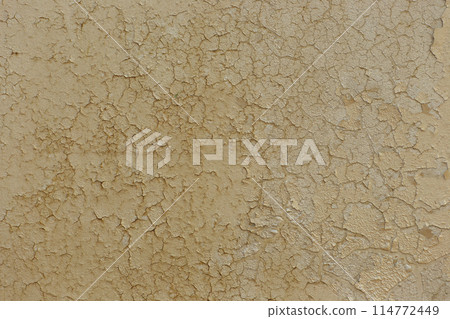 Retro Mustard Color Old Texture Cracked Peeling Paint Wall Surface Background 114772449