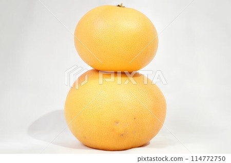A Tower of Citrus Two Stacked Grapefruits A Tower of Citrus Two Stacked Grapefruits 114772750