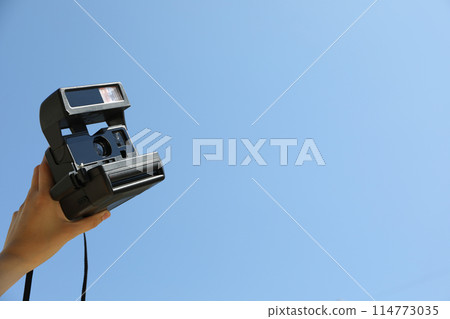 Retro camera, photo shooting on retro camera 114773035