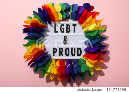 LGBT parade concept, holiday symbols on pink background. 114773066