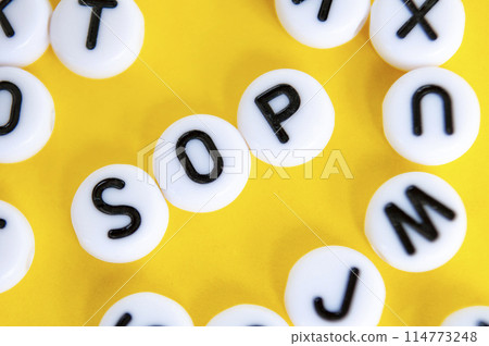 SOP representing standard operating procedures on yellow background. SOP representing standard operating procedures on yellow background. 114773248
