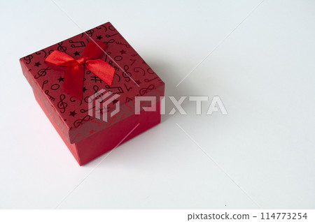 Red color present on white background with customizable space for text. Copy space and celebration. 114773254