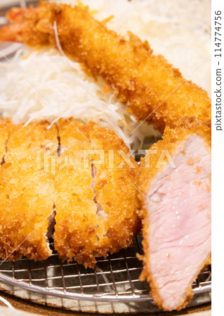 Mixed fries with delicious pork cutlets 114774756