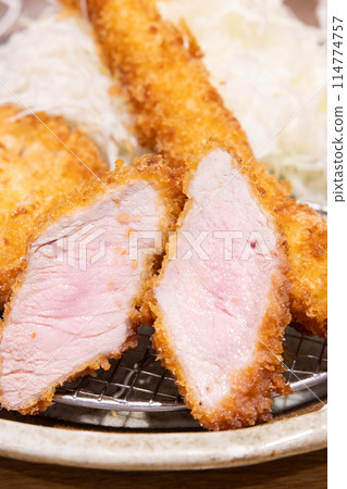 Mixed fries with delicious pork cutlets 114774757