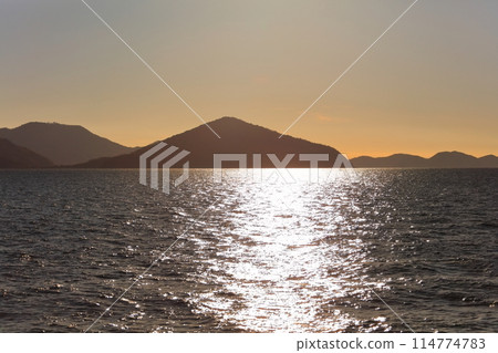 [Kagawa Prefecture] Sparkling evening view from a sightseeing boat (Seto Inland Sea, Setouchi) 114774783