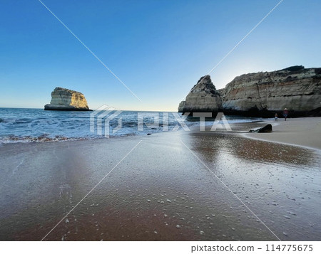 Beautiful seascape with beach, cliffs and ocean. Ferragudo, Portugal Beautiful seascape with beach, cliffs and ocean. Ferragudo, Portugal 114775675