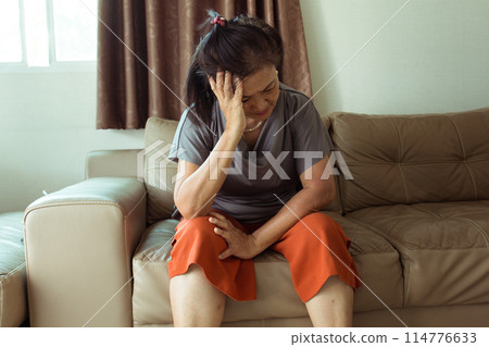 asian woman suffering from mental health feel sad 114776633