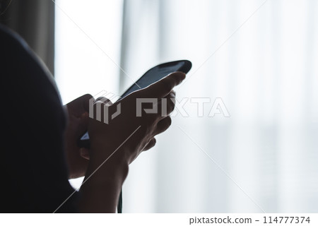 Smartphone and ladies 114777374