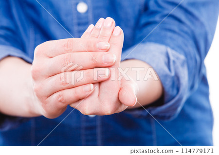 Woman presents hands nails. 114779171