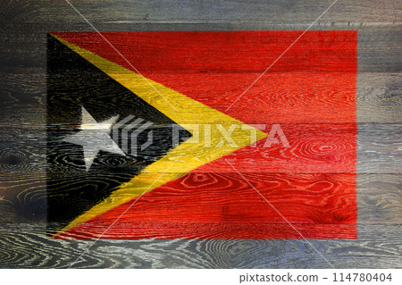 East Timor flag on rustic old wood surface background 114780404