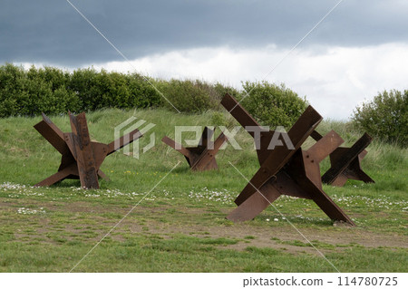 Normandy France D-Day hedgehogs near WWII Utah Beach. Veterans Day rememberance. High quality photo 114780725
