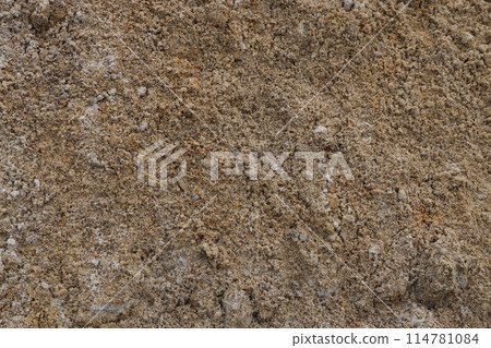 Surface structure of river sand. Large river sand at a construction site. Surface structure of river sand. Large river sand at a construction site. 114781084