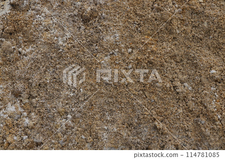 Surface structure of river sand. Large river sand at a construction site. Surface structure of river sand. Large river sand at a construction site. 114781085