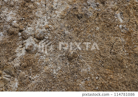 Surface structure of river sand. Large river sand at a construction site. Surface structure of river sand. Large river sand at a construction site. 114781086
