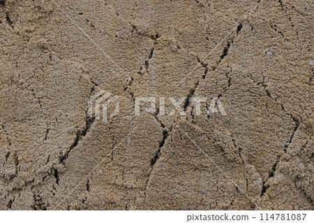 Surface structure of river sand. Large river sand at a construction site. Surface structure of river sand. Large river sand at a construction site. 114781087