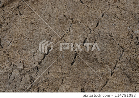 Surface structure of river sand. Large river sand at a construction site. Surface structure of river sand. Large river sand at a construction site. 114781088