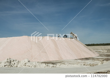 Trucks unloading raw salt bulk, Salinas Grandes de Hidalgo, La Pampa, Patagonia,  Argentina. 114782000