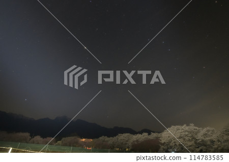 A large curve in spring above the cherry blossom trees in Mahara, Takekawa-cho, Hokuto City 114783585