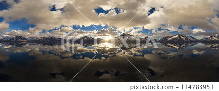 Dramatic Aerial Panorama of Clouds and Mountain Landscape. Nature Background. 114783951