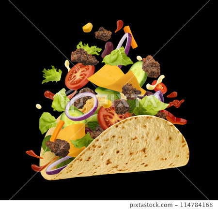 Mexican taco ingredients, corn tortilla wrap with falling beef meat and vegetables on black background, full depth of field Mexican taco ingredients, corn tortilla wrap with falling beef meat and vegetables on black background, full depth of field 114784168