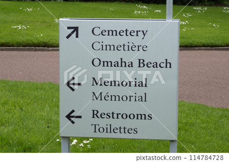 Directional sign at American cemetery at Normandy area. WWII memorial. High quality photo 114784728
