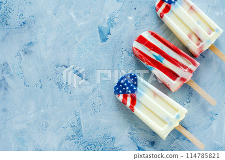 American flag popsicles on blue, top view, summer concept, space for text 114785821