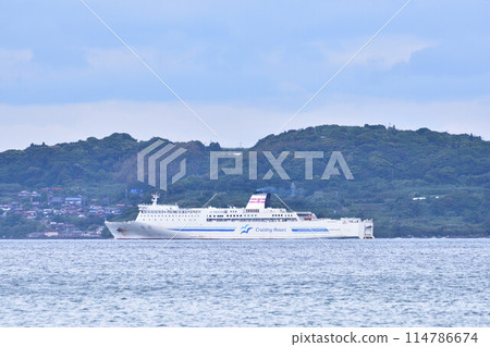 A docked ferry sailing through the Hibikinada Sea A docked ferry sailing through the Hibikinada Sea 114786674