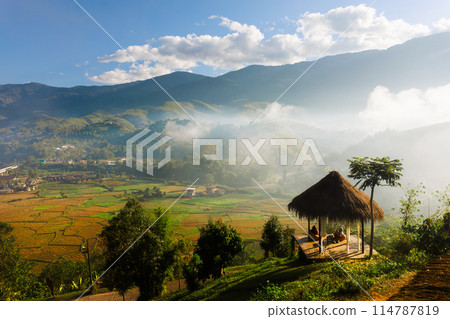 Sapan Village, a popular tourist attraction in northern Thailand that sees high mountains and rice fields in a small village in the middle of a valley in Nan Province, Thailand. Sapan Village, a popular tourist attraction in northern Thailand that sees high mountains and rice fields in a small village in the middle of a valley in Nan Province, Thailand. 114787819