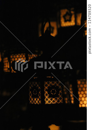 The warm light of the lantern The warm light of the lantern 114789320