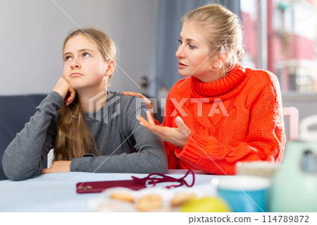 Woman and daughter offended at each other after quarrel 114789872