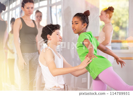 Teenage boy and girl rehearsing ballet choreography Teenage boy and girl rehearsing ballet choreography 114789931