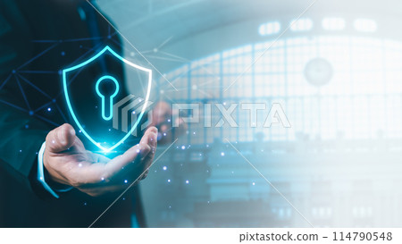 Businessman showing Symbolic shield represents protection against cybe rattacks and online hacking, Protection against external hacks, code protection security concepts, virus, firmware and malware. Businessman showing Symbolic shield represents protection against cybe rattacks and online hacking, Protection against external hacks, code protection security concepts, virus, firmware and malware. 114790548