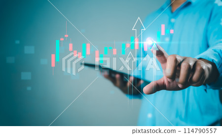 Businessman or trader is showing a growing virtual hologram stock, Invest in trading, Stock market, Business growth, progress or success concept. 114790557