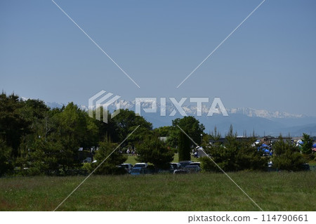 Superb view of Shinshu in spring, Northern Alps with remaining snow Superb view of Shinshu in spring, Northern Alps with remaining snow 114790661