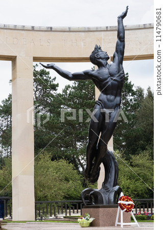 American cemetery staue Spirit of American Youth Rising from the Waves at Normandy area. WWII memorial. High quality photo 114790681
