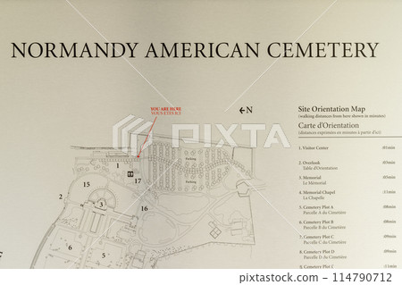 Overview map and sign at American cemetery at Normandy area. WWII memorial. High quality photo Overview map and sign at American cemetery at Normandy area. WWII memorial. High quality photo 114790712