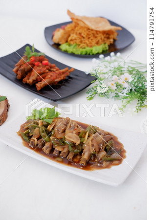 delicious spicy chicken feet as a background 114791754