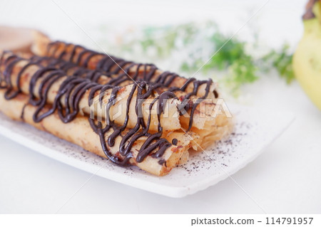 delicious chocolate flavored banana rolls 114791957