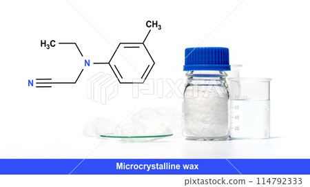 Microcrystalline wax with chemical formula on white laboratory table. Microcrystalline wax with chemical formula on white laboratory table. 114792333