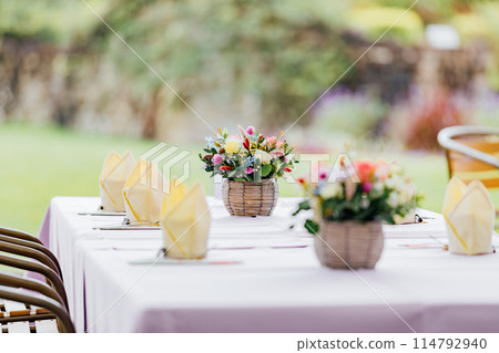 Wedding reception table setting 114792940