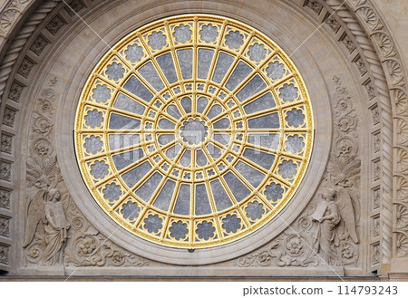 Rose window on the facade of Saint Augustine church in Paris, France 114793243