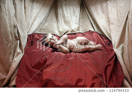 Baby Jesus figure under the main altar in the Church of Saint Catherine of Alexandria in Bethlehem, Israel Baby Jesus figure under the main altar in the Church of Saint Catherine of Alexandria in Bethlehem, Israel 114794333