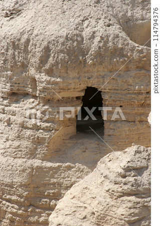 Archaeological site of Qumran where Dead Sea scrolls discovered in caves in cliffs, Judea Desert, Israel, 114794376