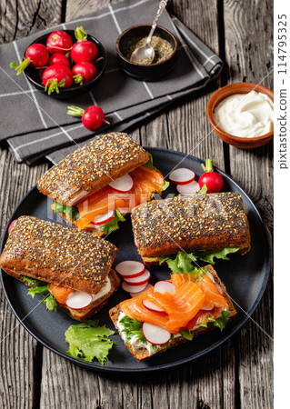 smoked salmon sandwiches on rye bread rolls smoked salmon sandwiches on rye bread rolls 114795325