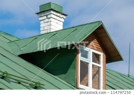 Green Metal Roof with Chimney and Dormer Green Metal Roof with Chimney and Dormer 114797250