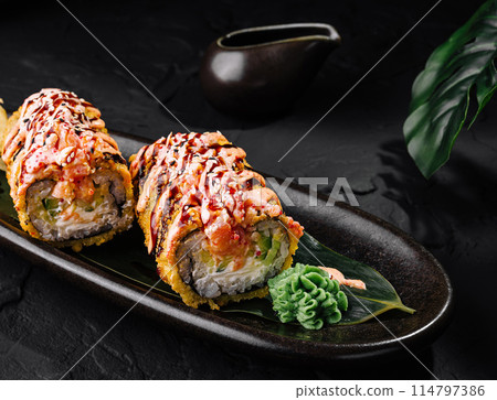 Gourmet tempura sushi roll with spicy sauce Gourmet tempura sushi roll with spicy sauce 114797386