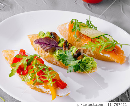 Gourmet bruschetta trio on elegant plate Gourmet bruschetta trio on elegant plate 114797451